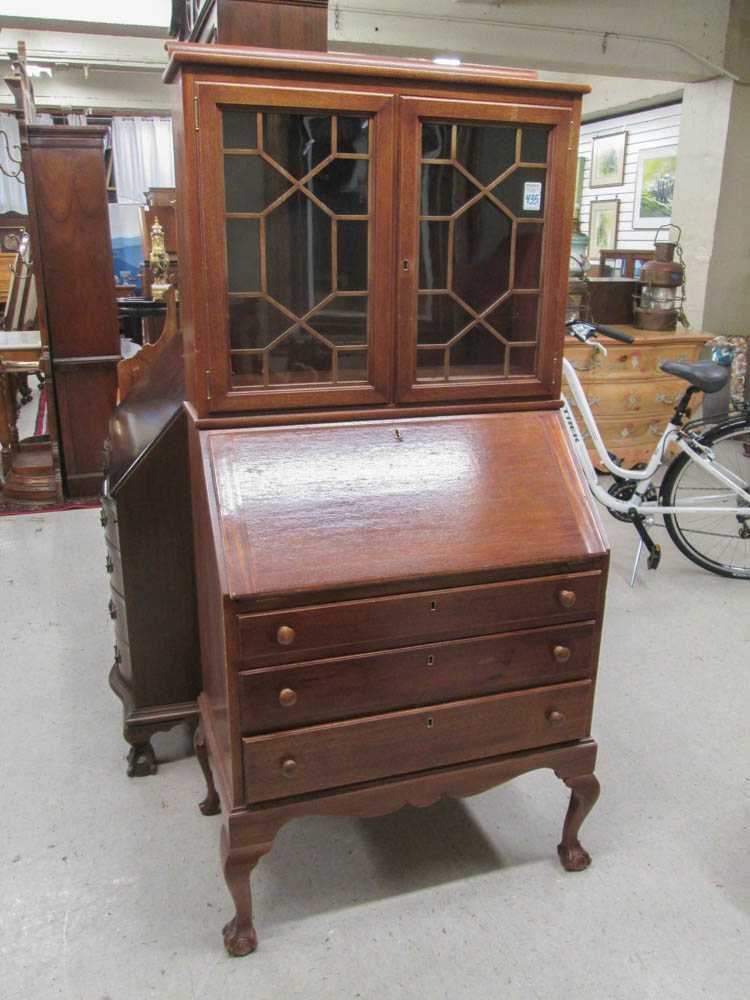 Appraisal: CHIPPENDALE STYLE MAHOGANY SECRETARY BOOKCASE Master-Made Furniture Co American c