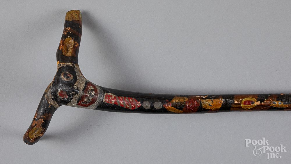 Appraisal: Carved and painted cane early th c Carved and painted