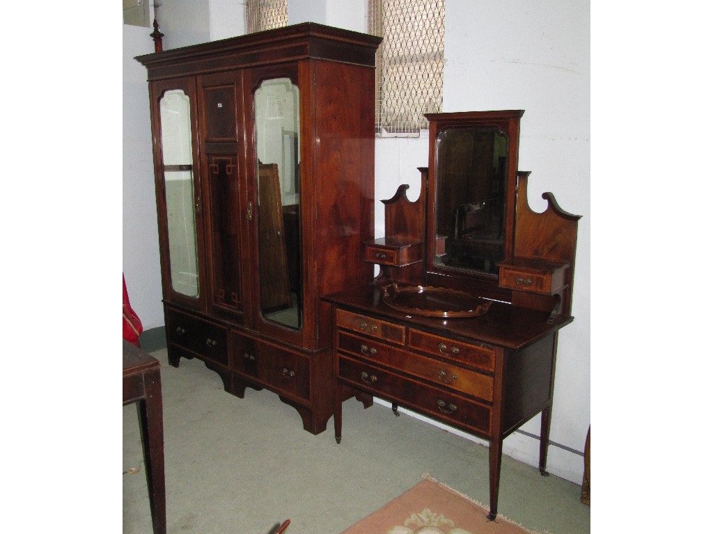 Appraisal: Edwardian mahogany and cross banded double mirror door wardrobe and