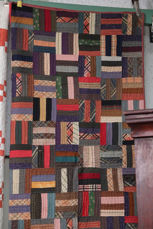 Appraisal: QUILT A Log Cabin quilt having a maroon back and