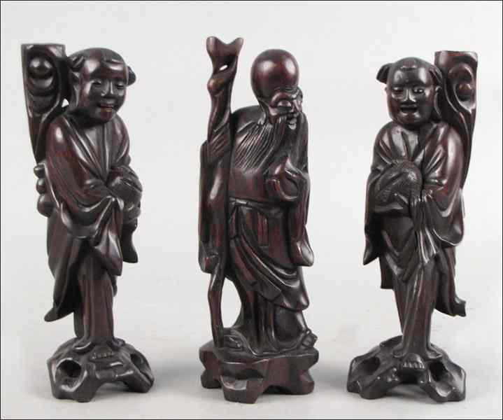 Appraisal: THREE CHINESE CARVED WOOD FIGURES Tallest '' Condition No Specific