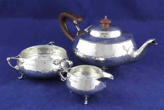 Appraisal: A stylish George V Arts Crafts silver three piece tea