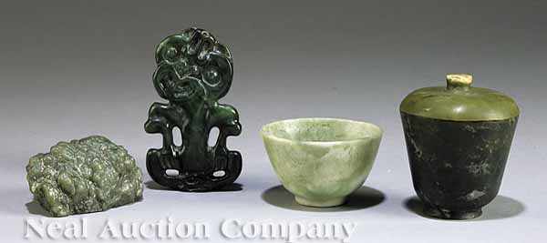 Appraisal: A Group of Chinese Carved Stone Objects comprising a mottled