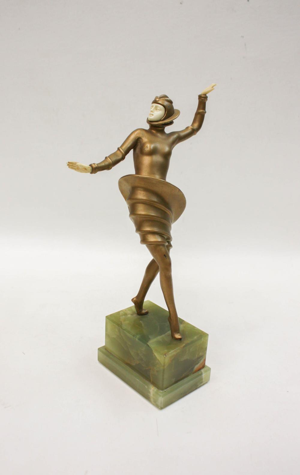 Appraisal: GILT BRONZE ART DECO DANCER mounted on a rectangular onyx