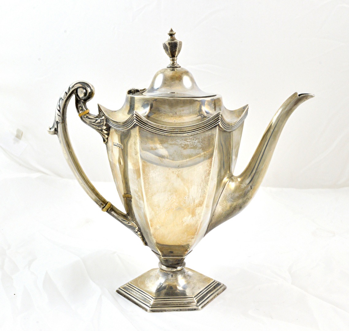 Appraisal: A George III style silver coffee pot Walker Hall Sheffield