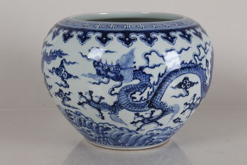 Appraisal: A CHINESE DRAGON-DECORATING BLUE AND WHITE PORCELAIN PO A Chinese