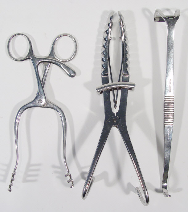 Appraisal: Three World War II military medical instruments - A hooked