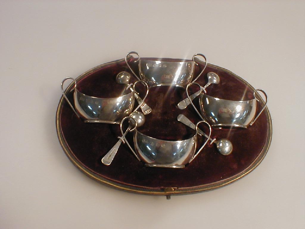 Appraisal: A cased set of four Victorian silver two handled boat