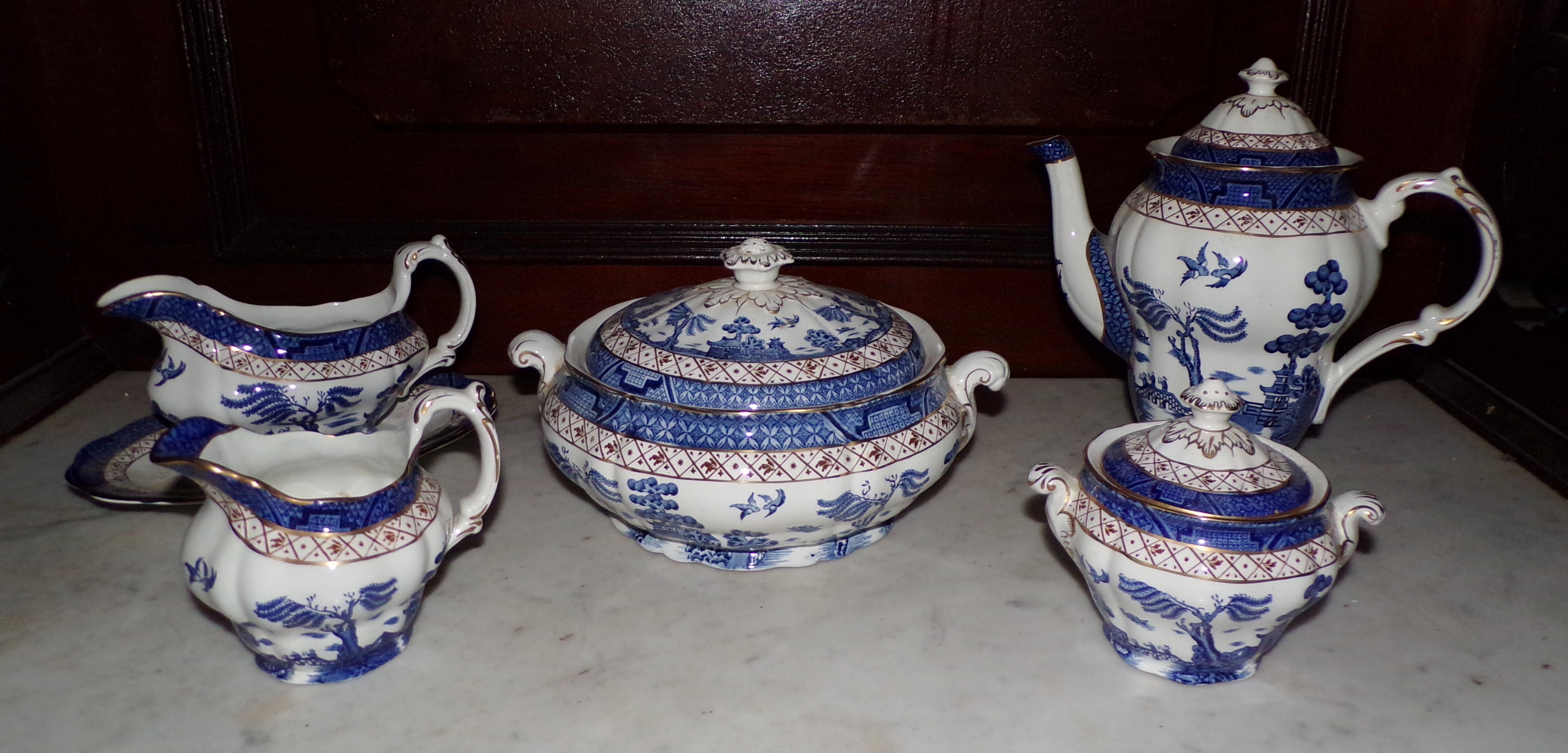 Appraisal: Booth porcelain china service Real Old Willow pattern including teapot