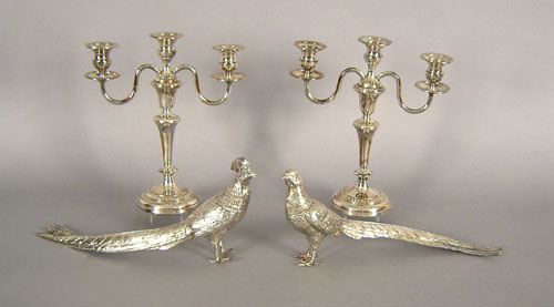 Appraisal: Pair of silver plated candelabra h together with a pair