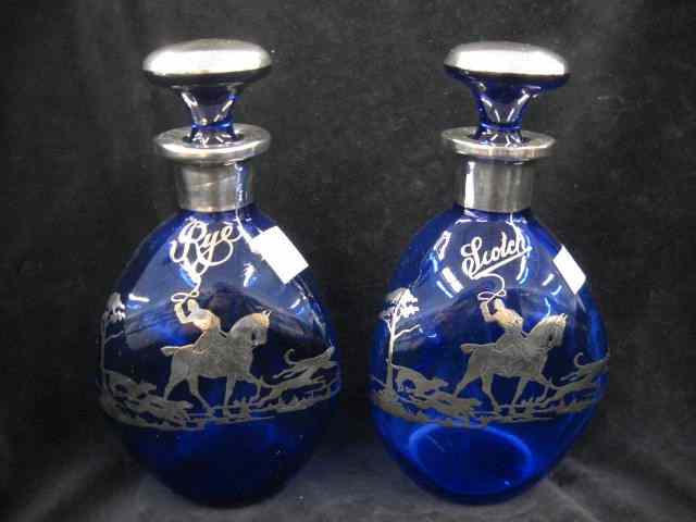 Appraisal: Pair of Silver Overlay Fox Hunt Decanters fine cobalt blue