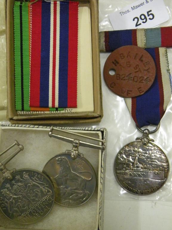 Appraisal: A George VI long service in the Naval Reserves medal