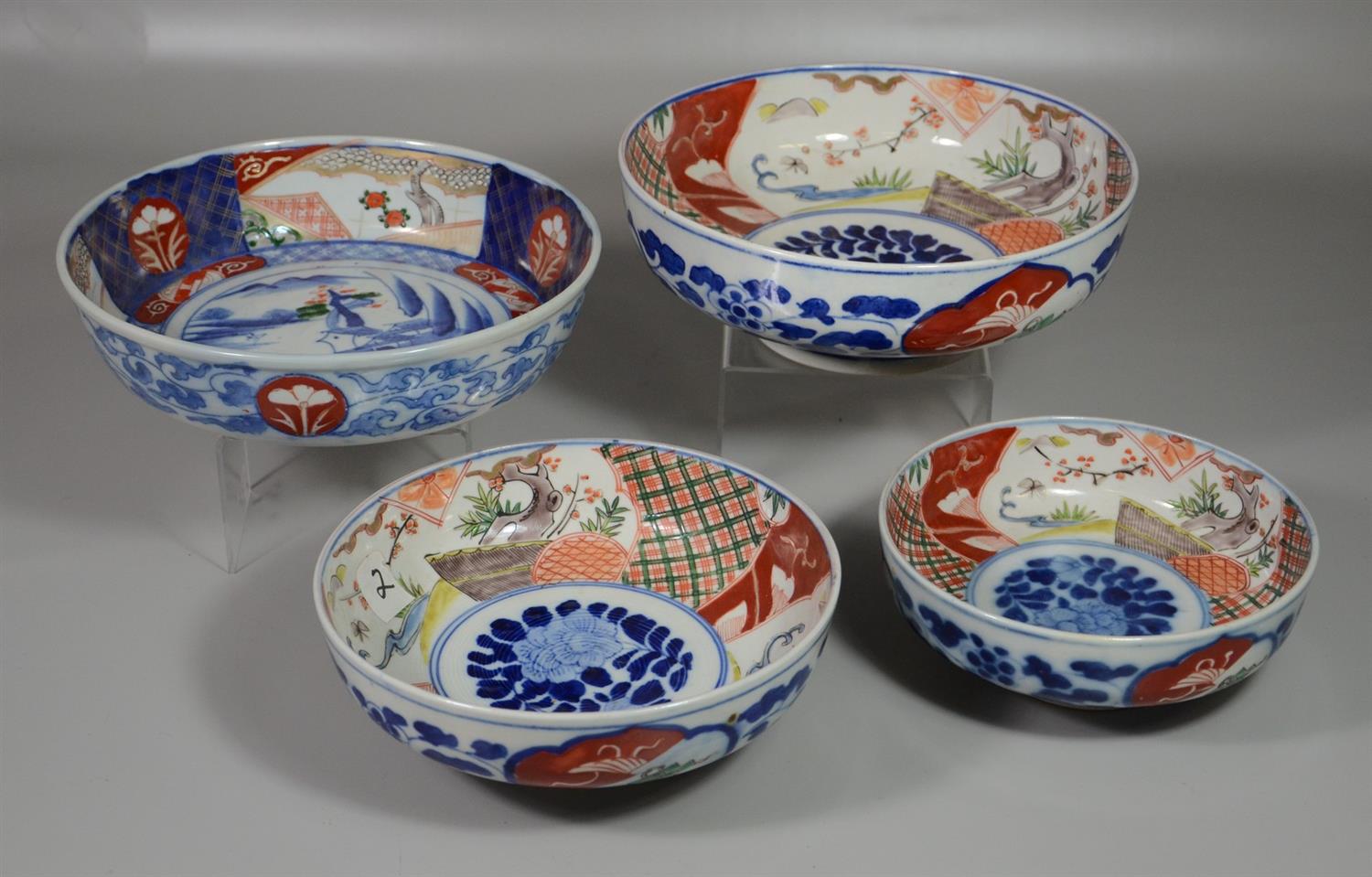 Appraisal: Japanese Imari Porcelain Bowls to include nest of bowls largest