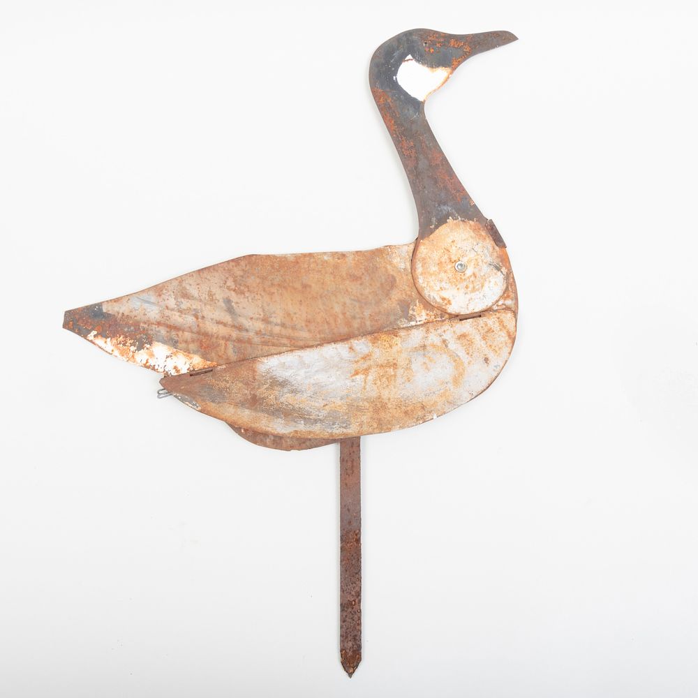 Appraisal: Folk Art Painted Metal Goose Decoration With articulated wings in