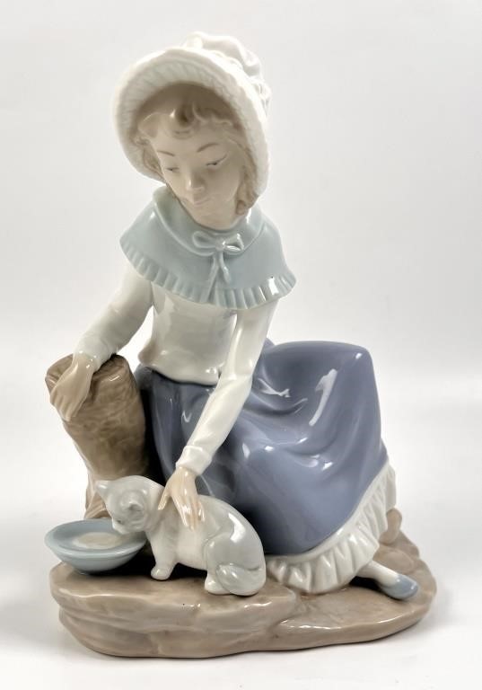 Appraisal: Nao Lladro gloss porcelain figurine of a young girl feeding