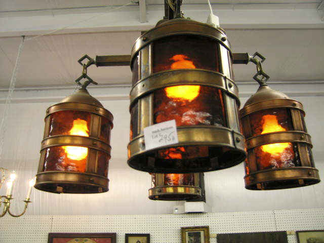 Appraisal: Arts Crafts Chandelier with Hanging lanterns amber glass shades