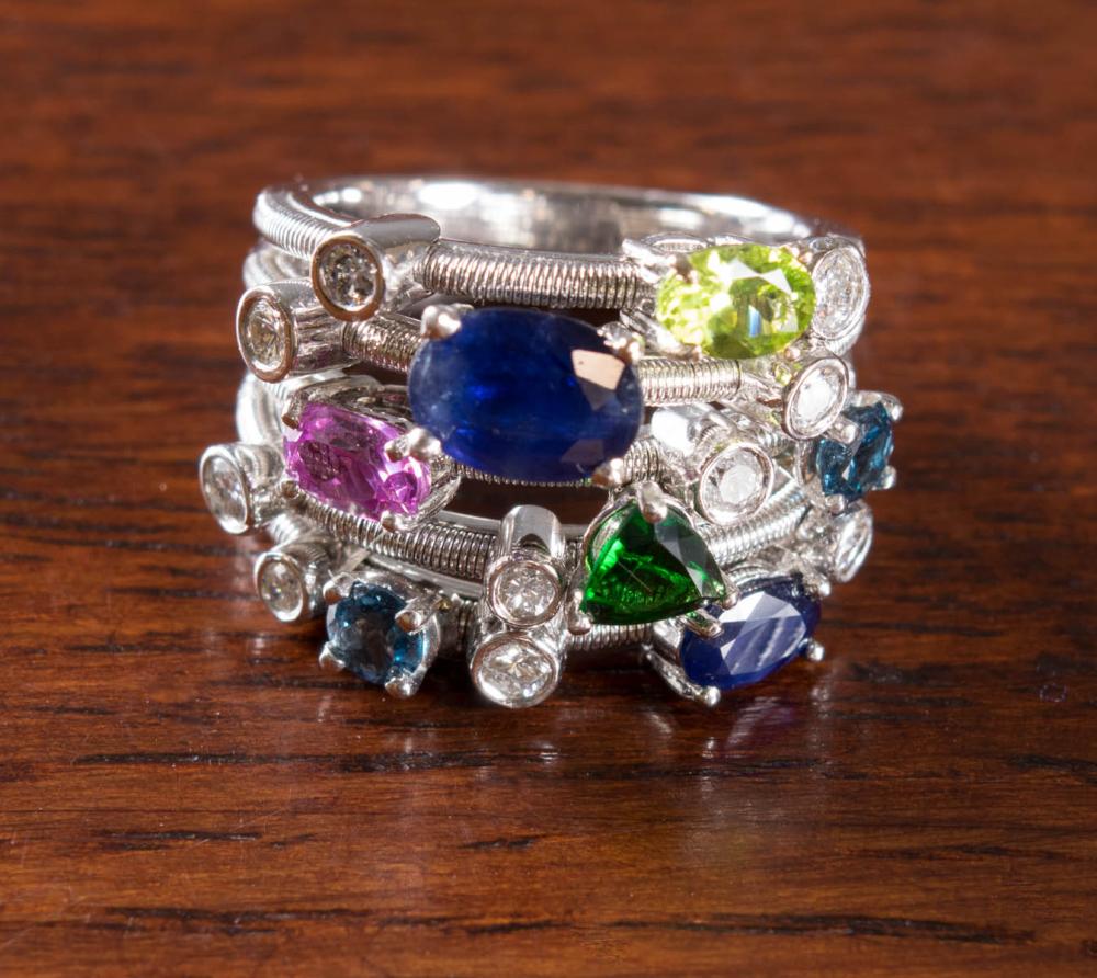 Appraisal: MULTI-COLOR GEMSTONE DIAMOND AND FOURTEEN KARAT GOLD RING The heavy