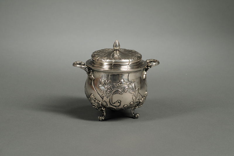 Appraisal: Silver Footed and Covered Dish French-style marks flame finial scrolled