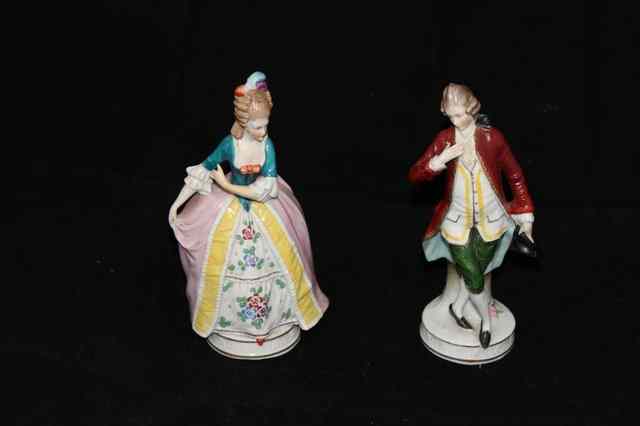 Appraisal: A PAIR OF PARIS PORCELAIN FIGURES of a Gentleman and