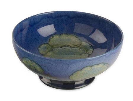 Appraisal: MOORCROFT POTTERY FOOTED BOWL CIRCA glazed earthenware decorated in the