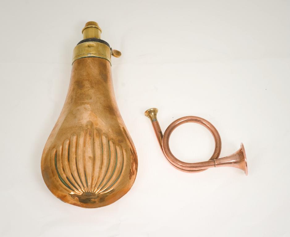 Appraisal: th CENTURY COPPER POWDER FLASK of characteristic form with gadrooned