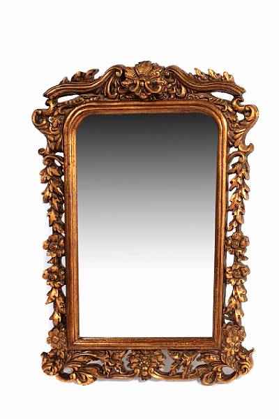 Appraisal: A Rococo style composition mirror modern height in width in