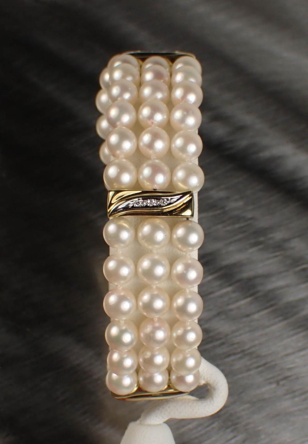 Appraisal: PEARL DIAMOND AND FOURTEEN KARAT GOLD BRACELET The - triple