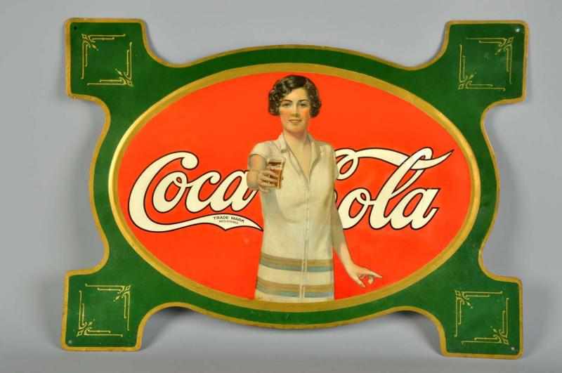 Appraisal: Embossed Tin Coca-Cola Die-Cut Sign Description Difficult sign to find