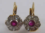 Appraisal: A pair of yellow metal tests carat gold ruby and