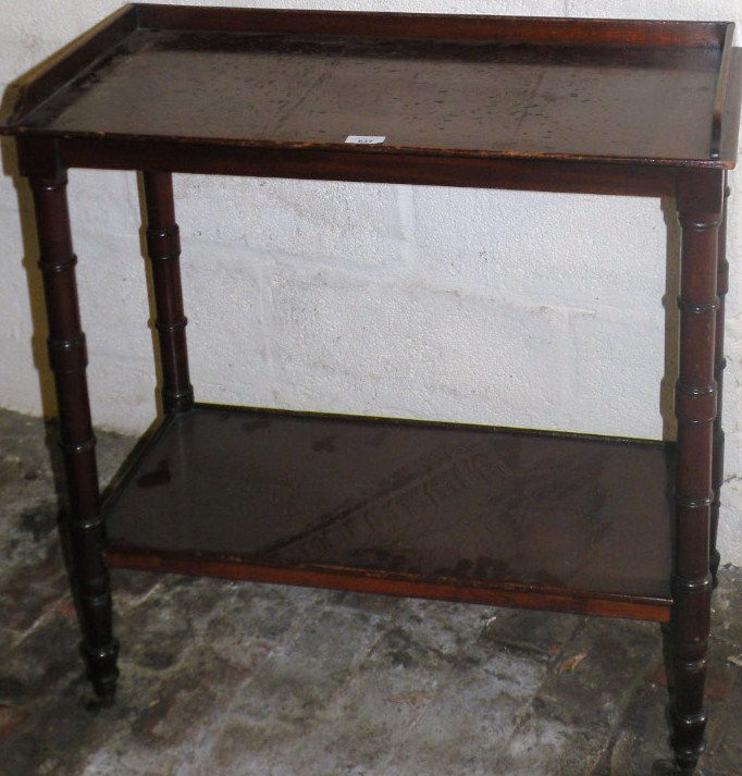 Appraisal: A late thC mahogany two tier buffet the upper section