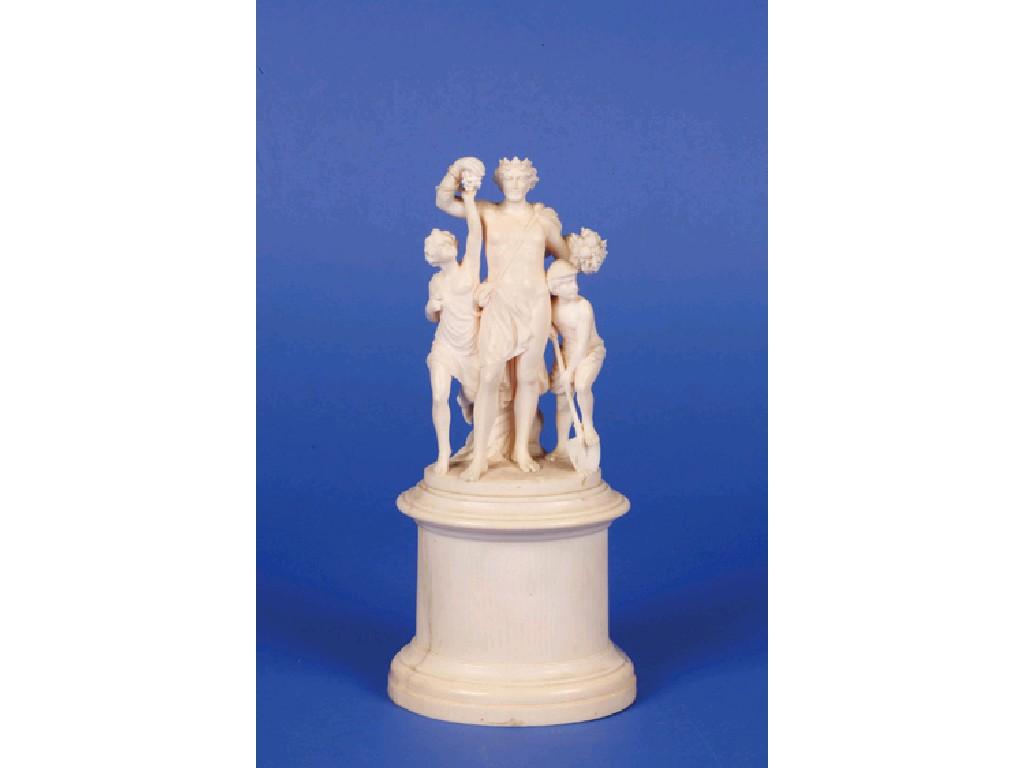 Appraisal: A CARVED IVORY GROUP OF A LOOSELY DRAPED GOD holding