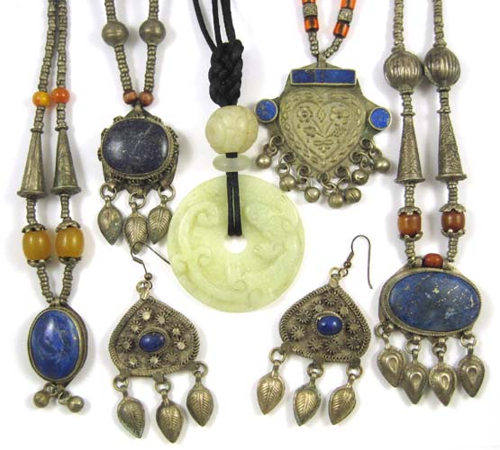 Appraisal: FIVE ORIENTAL TRADE NECKLACES WITH EARRINGS each with bead and