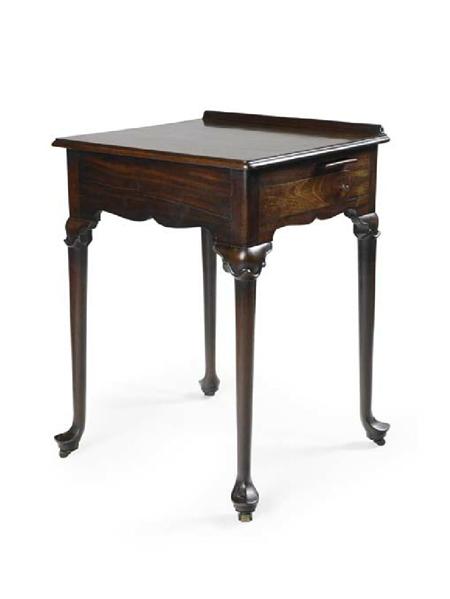 Appraisal: A George II mahogany architect's table the square top with