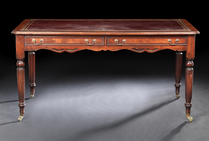 Appraisal: William IV-Style Mahogany Writing Table the rounded rectangular top with