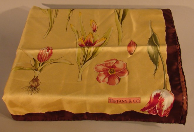 Appraisal: Tiffany Co brown gold silk scarf with flower garden design