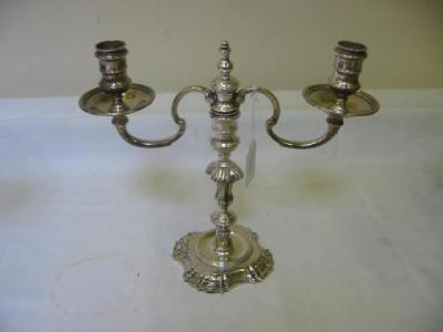 Appraisal: A CAST CANDELABRUM in the George III style the turned