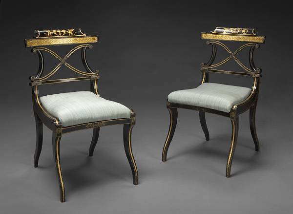 Appraisal: A pair of Regency gilt metal mounted and parcel gilt