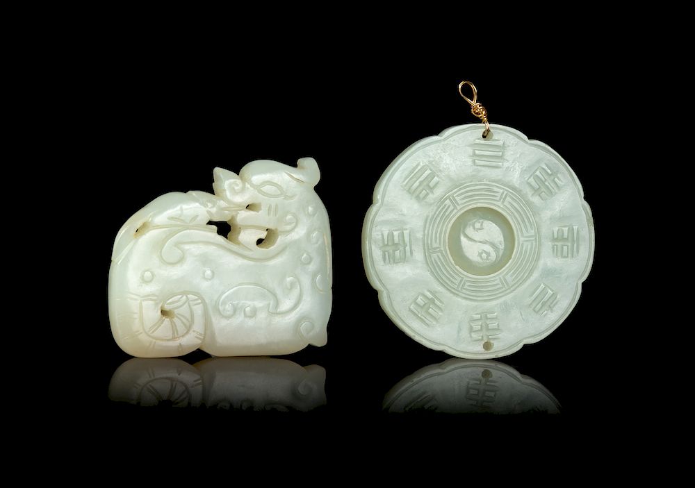 Appraisal: Two Celadon Jade Pendants Larger diam in cm Two Celadon