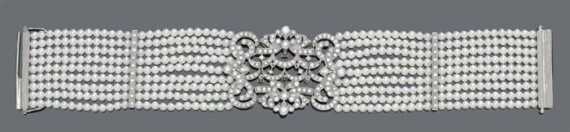 Appraisal: PEARL AND DIAMOND BRACELET White gold Fancy nine-row bracelet in