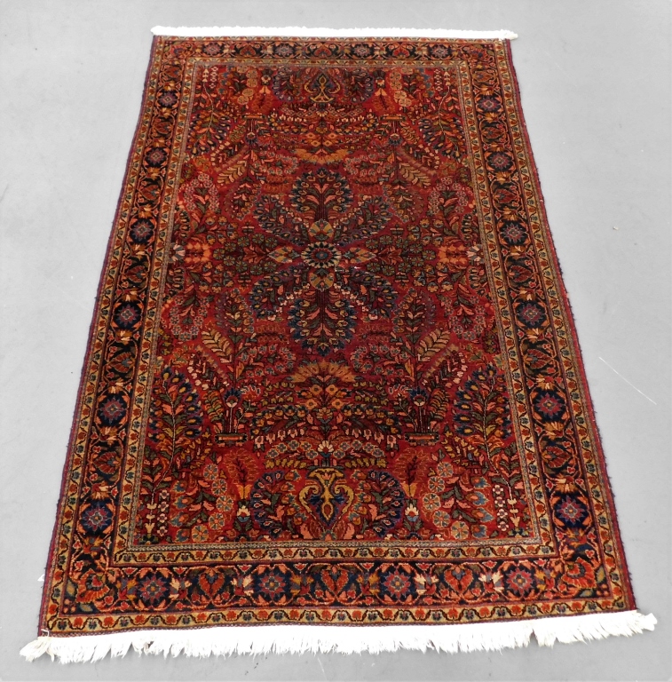 Appraisal: PERSIAN SAROUK RUG Middle East th CenturyNavy pink and tan