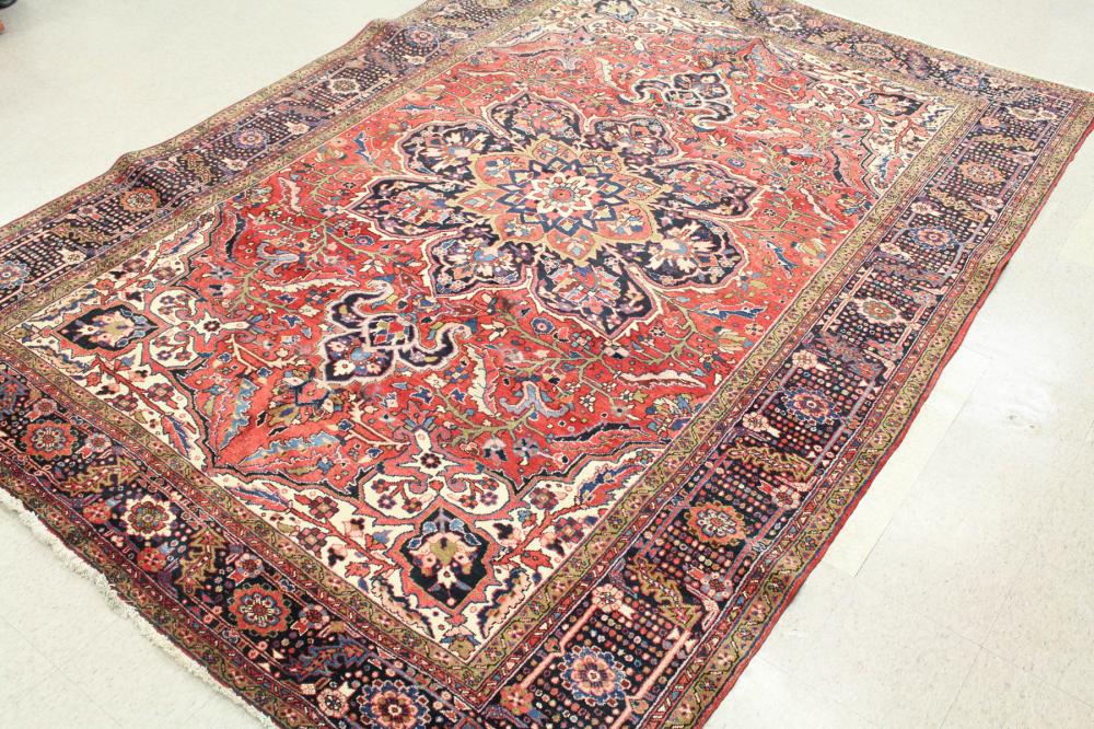 Appraisal: SEMI-ANTIQUE PERSIAN HERIZ CARPET East Azerbaijan Province northwest Iran floral