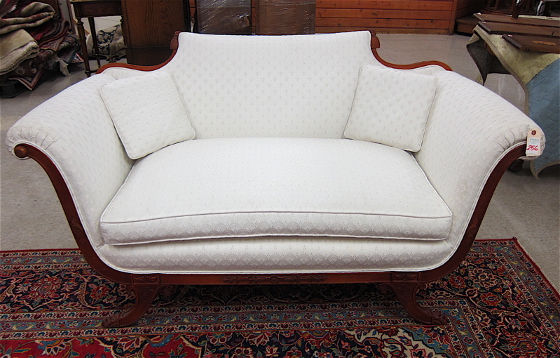 Appraisal: FEDERAL STYLE LOVESEAT American mid- th century having a carved