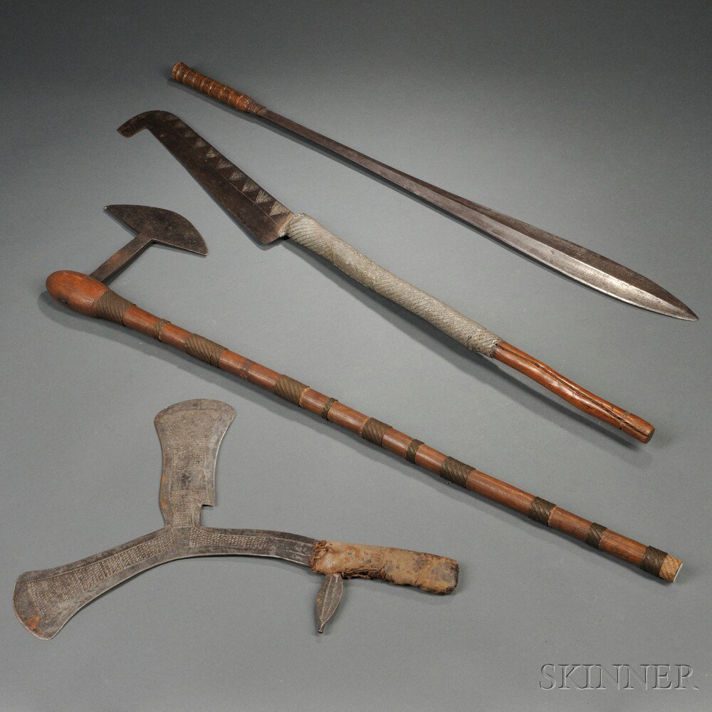 Appraisal: Four African Weapons includes a Zulu axe a Massai sword