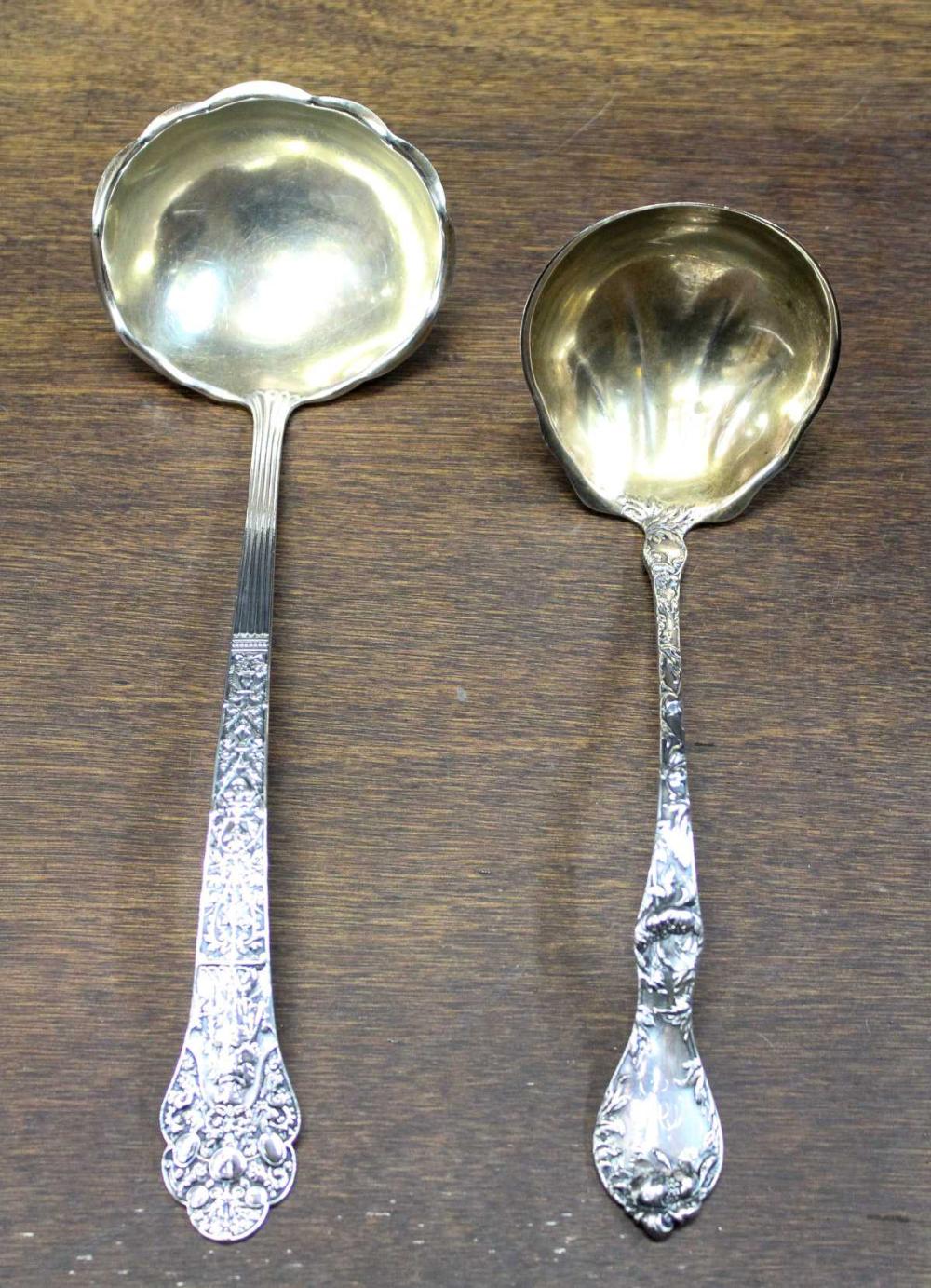 Appraisal: TWO SOLID STERLING SILVER SOUP LADLES including the Gorham Medici