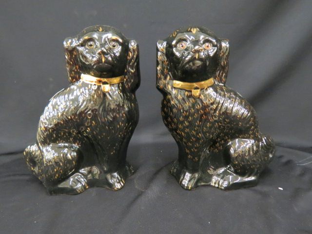 Appraisal: Pair of Black Jackfield Staffordshire Pottery Dogsspaniel figurines red clay