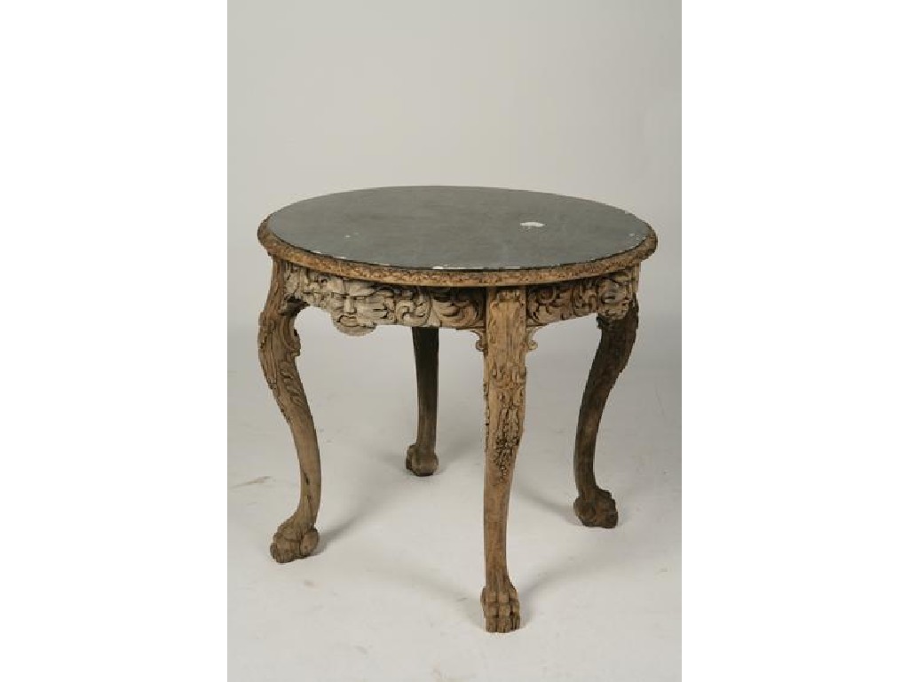 Appraisal: A BAROQUE GROTTO CENTRE TABLE the circular top with a