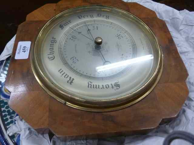 Appraisal: A WALNUT CASED ANEROID BAROMETER by Shortland Smiths together with