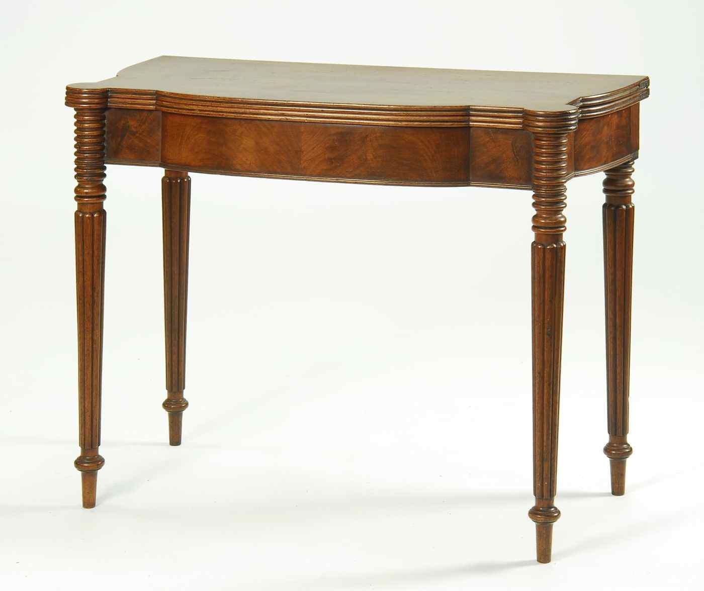 Appraisal: ANTIQUE AMERICAN SHERATON CARD TABLECirca In mahogany with shaped front