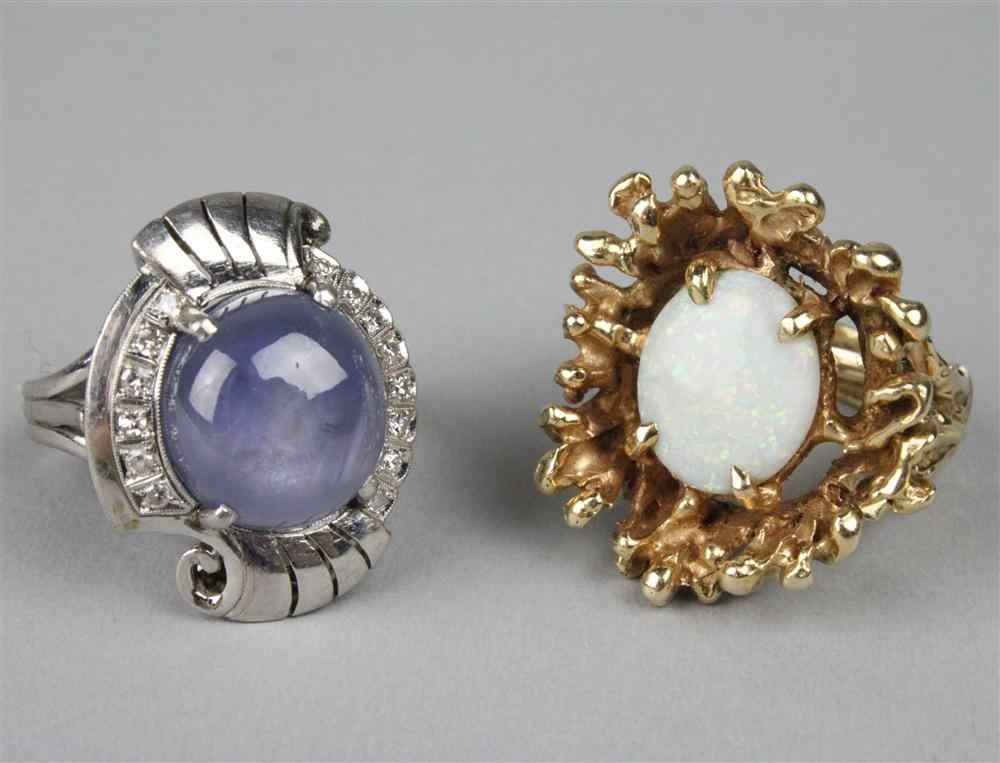 Appraisal: TWO LADY'S GOLD AND GEMSET COCKTAIL RINGS the first of