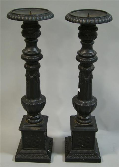 Appraisal: PAIR OF BLACK PAINTED CAST IRON PRICKET STICKS h w